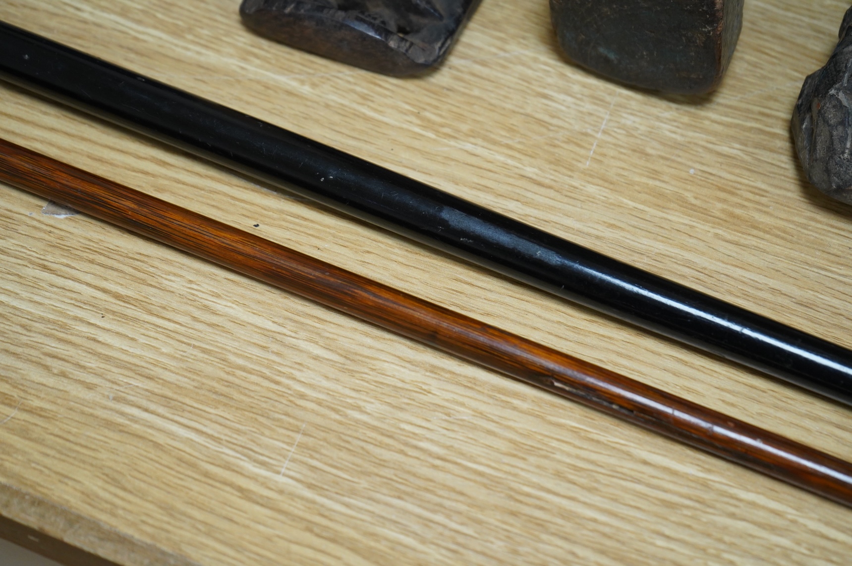 Two silver topped walking canes, largest 94cm in length